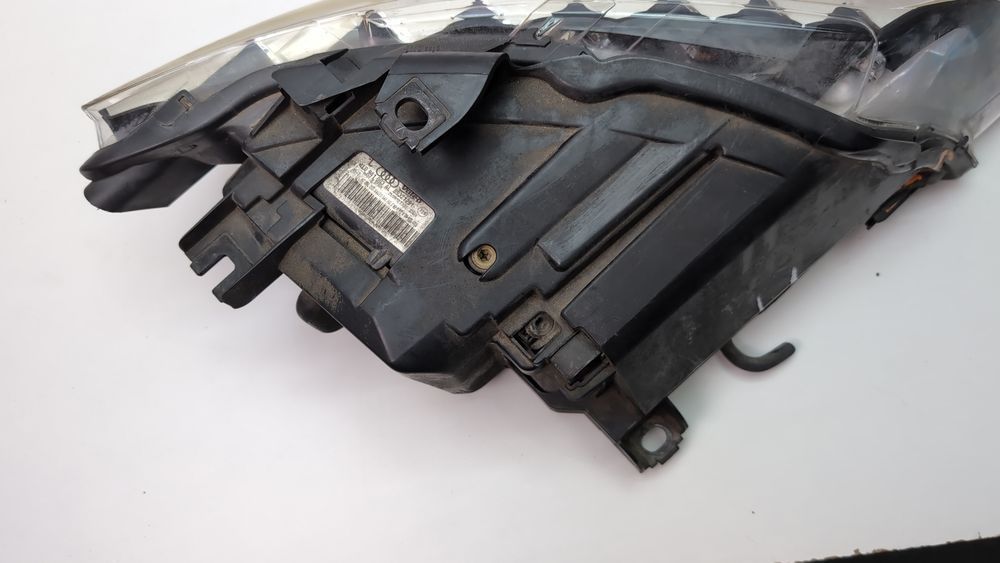 Корпус передньої лівої фари (дефект) Audi Q7 2009-2015 (4L restyle) 4L0941613B 1077700 фото