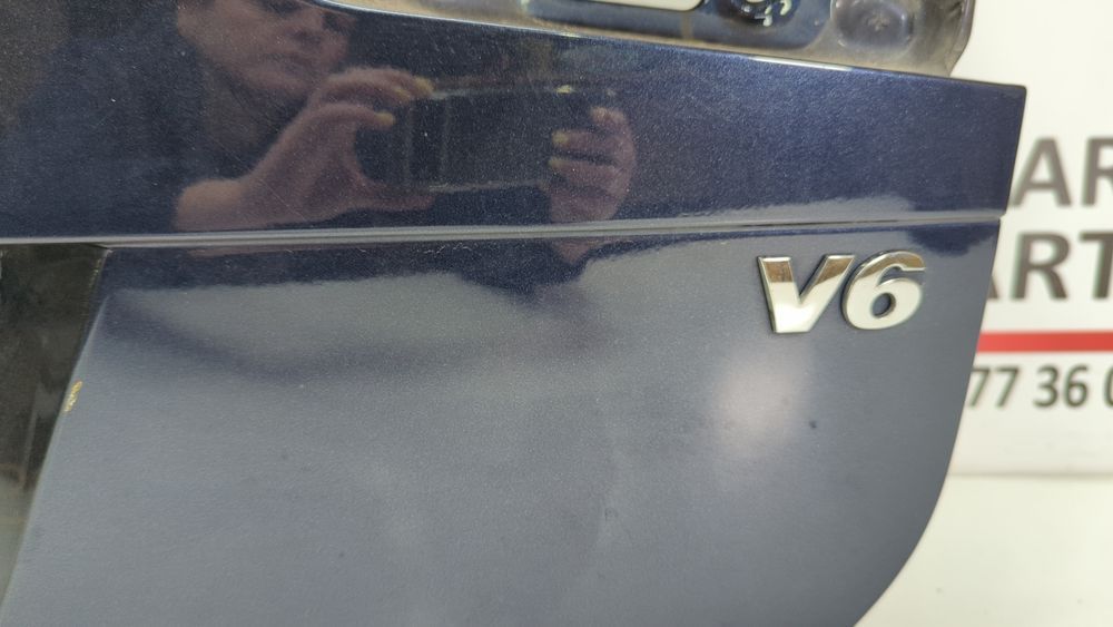 Емблема v6 Volkswagen Touareg 2010-2014 (7P 2nd gen) 7P6853675E739 1038630 фото