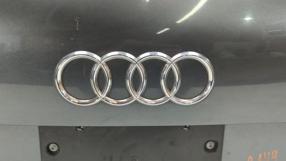Емблема кришки багажника audi кільця Audi Q7 2009-2015 (4L restyle) 4L08537422ZZ 1056934 фото