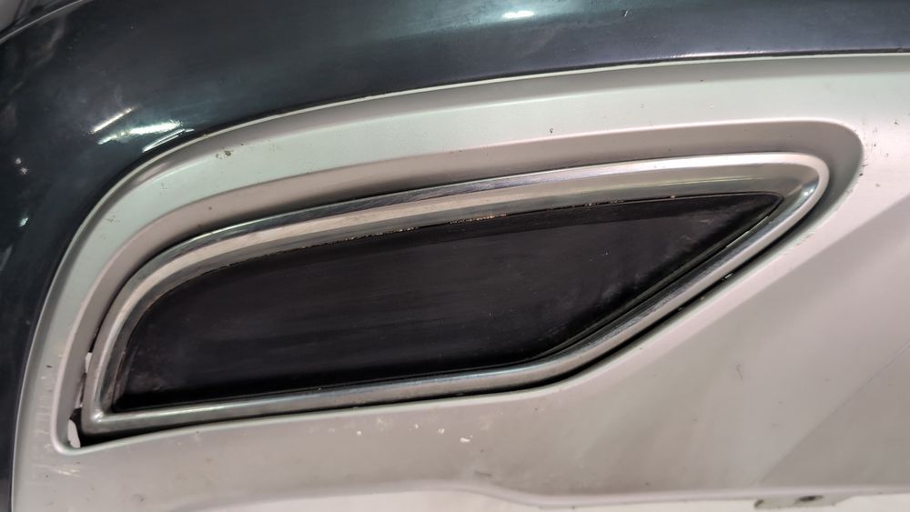 Накладка на задній лівий бампер, хромована Audi Q5 2018-2020 (80A) 80A8078332ZZ 1107151 фото